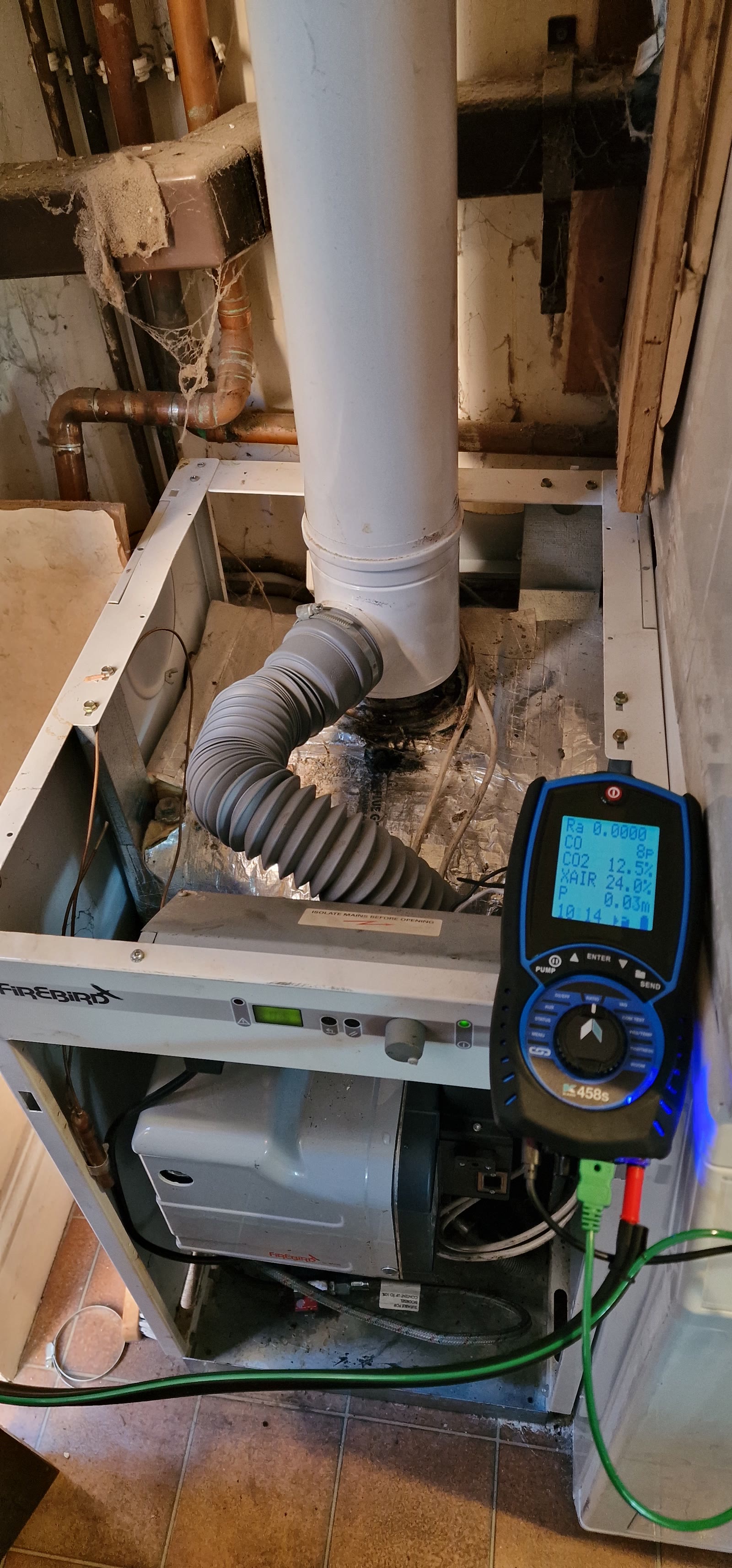Firebird oil boiler opened for combustion testing after a burner replacement in Escrick